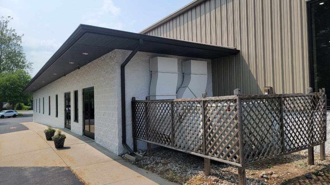 Church painting exterior HVAC enclosure and painted block — service area painting (Speese Painting)