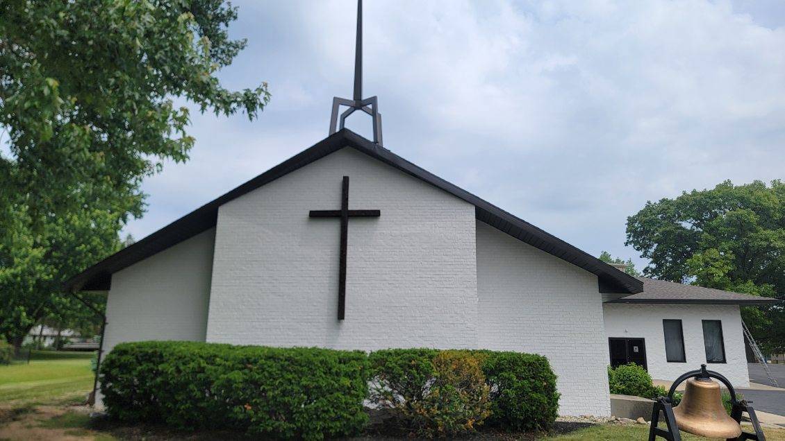 Church painting exterior painted brick with cross — front corner view (Speese Painting)