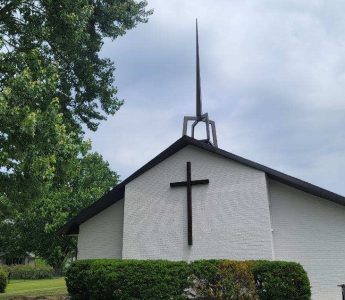 Church painting exterior painting — white painted brick side view (Speese Painting)