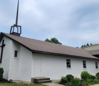 Church exterior painting and steeple — wide front view (Speese Painting)
