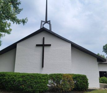Church painting exterior painted brick with cross — front corner view (Speese Painting)