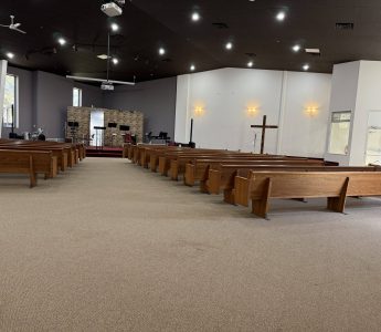 Church Painting sanctuary interior painting — dark ceiling, white walls, pews (Speese Painting)